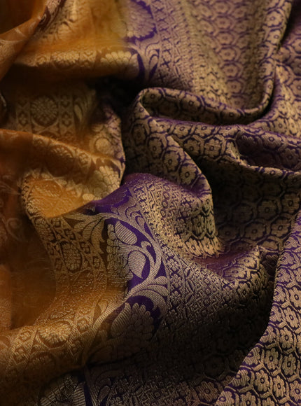 Kanchipuram silk saree dark mustard and deep violet with allover zari woven brocade weaves and long annam zari woven border