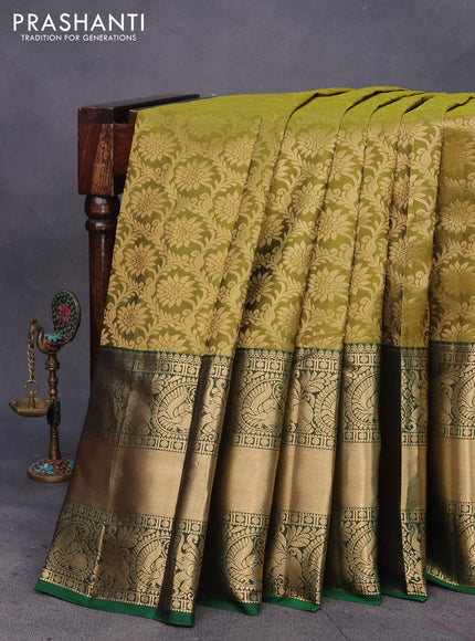 Kanchipuram silk saree mehendi green and green with allover zari woven brocade weaves and long annam zari woven border