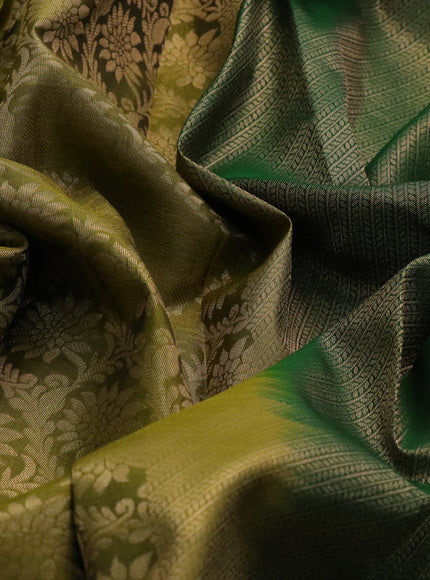 Kanchipuram silk saree mehendi green and green with allover zari woven brocade weaves and long annam zari woven border