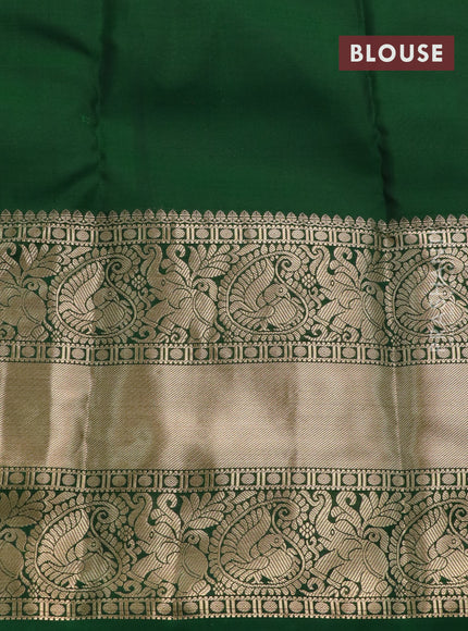 Kanchipuram silk saree mehendi green and green with allover zari woven brocade weaves and long annam zari woven border