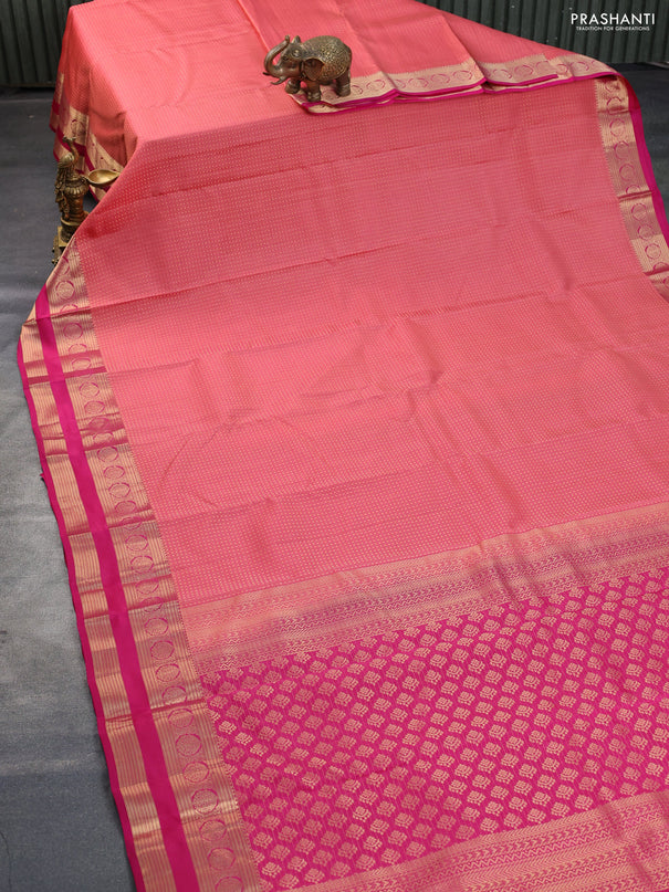 Kanchipuram silk saree peach pink and pink with allover zari woven butta weaves and rettapet zari woven border