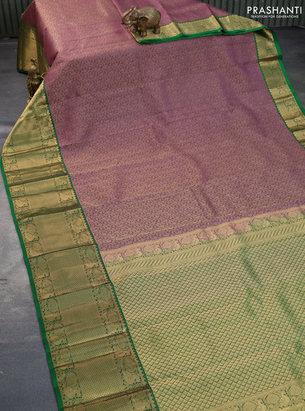 Kanchipuram silk saree purple shade and green with allover zari woven brocade weaves and long zari woven annam border