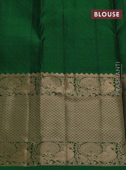 Kanchipuram silk saree purple shade and green with allover zari woven brocade weaves and long zari woven annam border