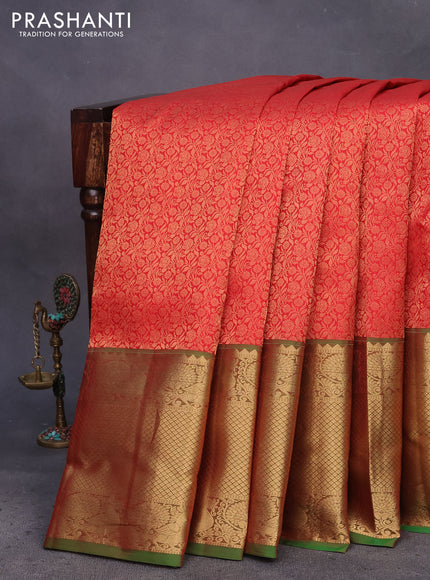 Kanchipuram silk saree red shade and green with allover zari woven brocade weaves and long zari woven annam border