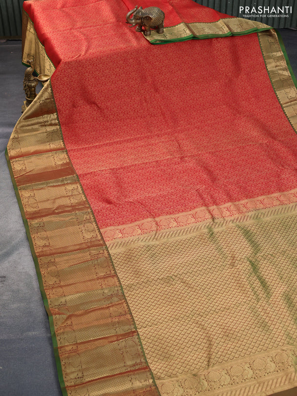 Kanchipuram silk saree red shade and green with allover zari woven brocade weaves and long zari woven annam border