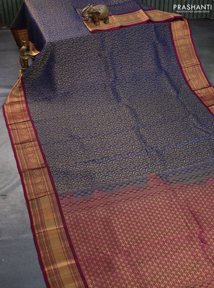 Kanchipuram silk saree dark blue and magenta pink with allover zari woven brocade weaves and zari woven border