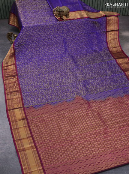 Kanchipuram silk saree blue and magenta pink with allover zari woven brocade weaves and zari woven border