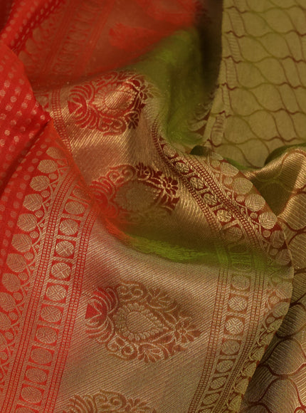 Kanchipuram silk saree orange and mehendi green with allover zari woven butta weaves and long annam zari woven border