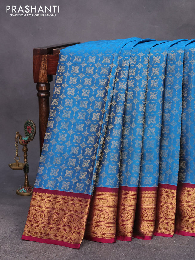 Kanchipuram silk saree cs blue and magenta pink with allover zari woven brocade weaves and zari woven border