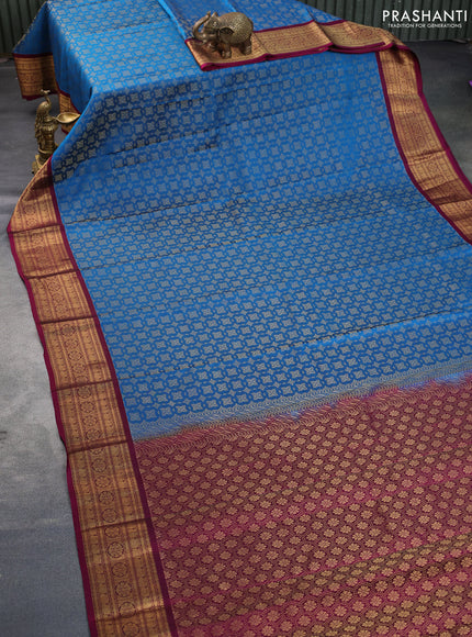 Kanchipuram silk saree cs blue and magenta pink with allover zari woven brocade weaves and zari woven border