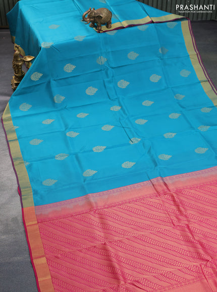 Kanchipuram silk saree teal blue shade and pink with zari woven buttas and zari woven border