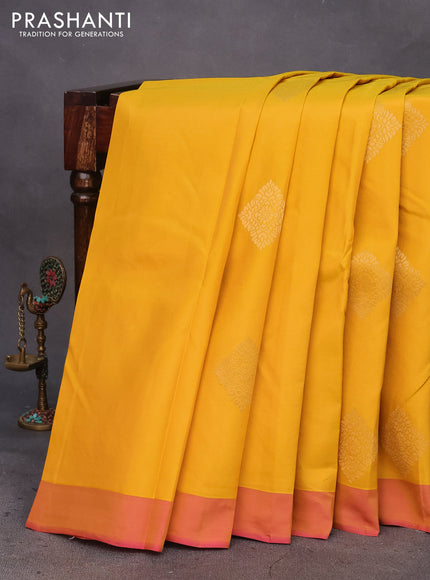 Kanchipuram silk saree mango yellow and pink with zari woven buttas and simple border