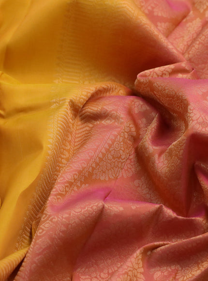 Kanchipuram silk saree mango yellow and pink with zari woven buttas and simple border