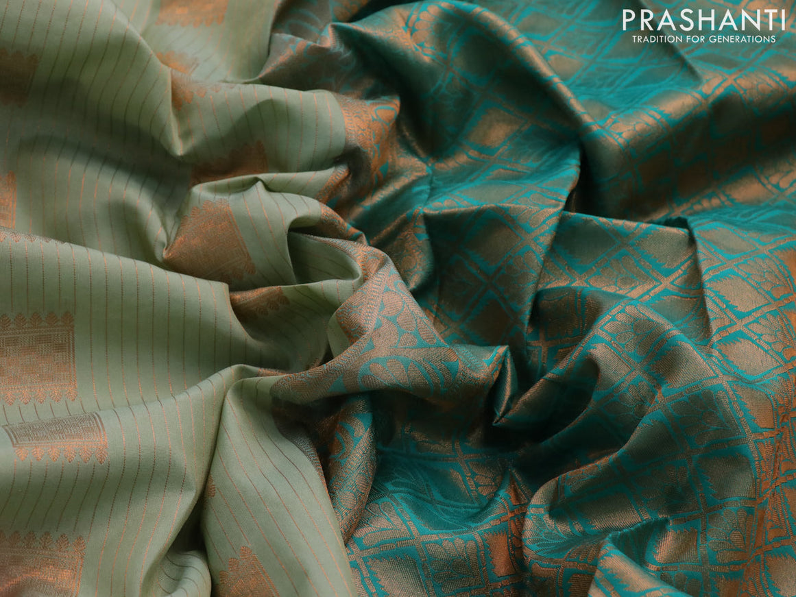 Kanchipuram silk saree pastel green and teal green with allover copper zari weaves & buttas and rettapet copper zari woven border