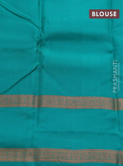 Kanchipuram silk saree pastel green and teal green with allover copper zari weaves & buttas and rettapet copper zari woven border