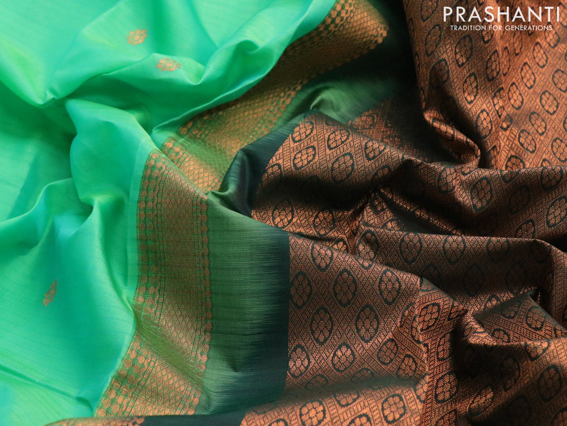 Kanchipuram silk saree green and bottle green with copper zari woven buttas and rettapet copper zari woven border