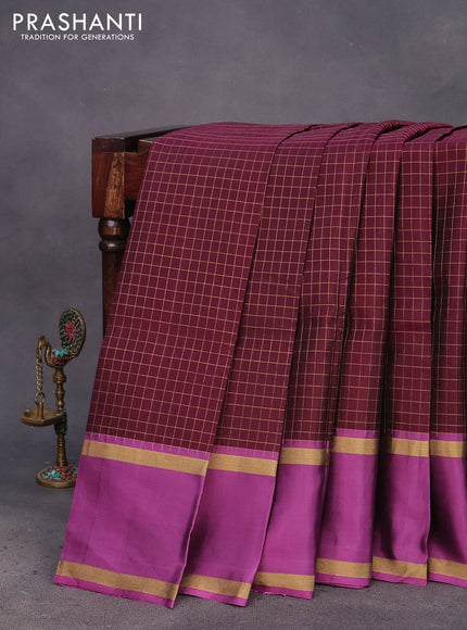 Kanchipuram silk saree wine shade and purple with allover zari checked pattern and rettapet zari woven border