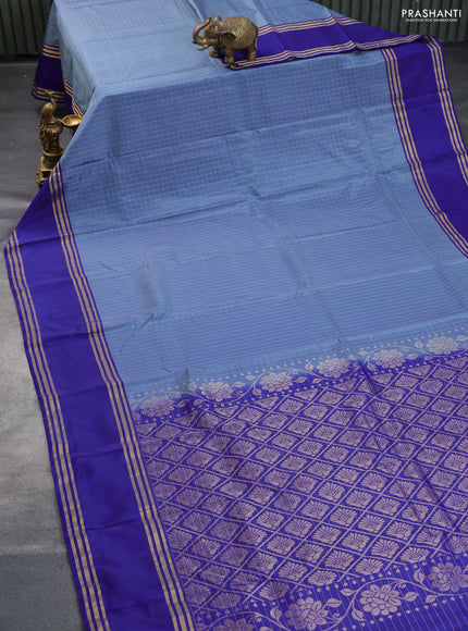 Kanchipuram silk saree blue shade and blue with allover zari checked pattern and rettapet zari woven border