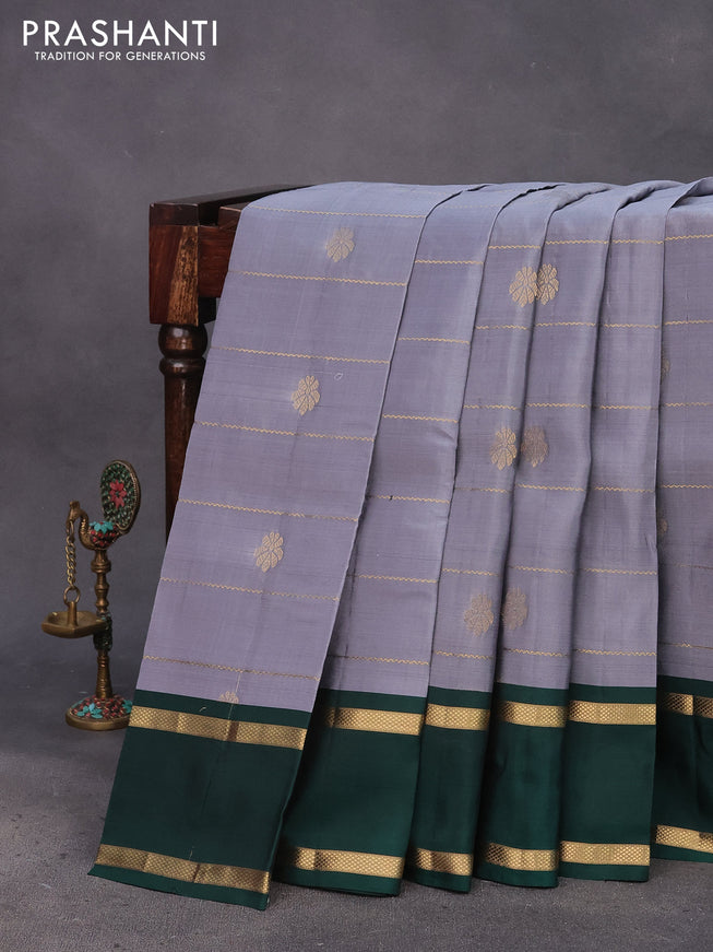 Kanchipuram silk saree grey and bottle green with allover zari weaves & buttas and rettapet zari woven border