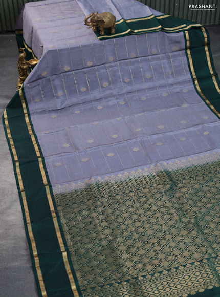 Kanchipuram silk saree grey and bottle green with allover zari weaves & buttas and rettapet zari woven border