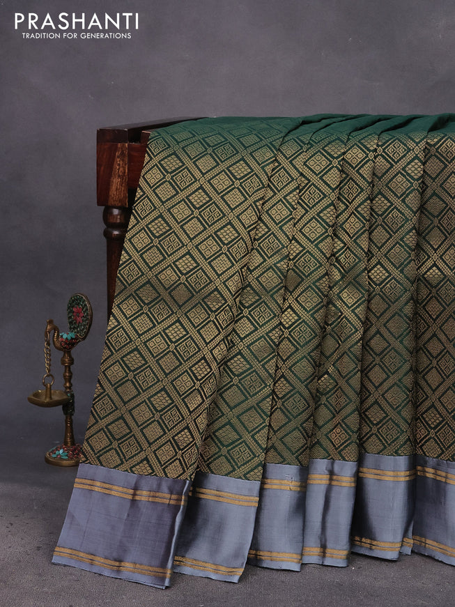 Kanchipuram silk saree dark green and grey with allover zari woven brocade weaves and rettapet zari woven border