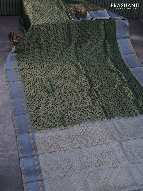 Kanchipuram silk saree dark green and grey with allover zari woven brocade weaves and rettapet zari woven border