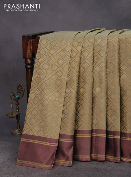 Kanchipuram silk saree elaichi green shade and rosy brown with allover zari woven brocade weaves and rettapet zari woven border