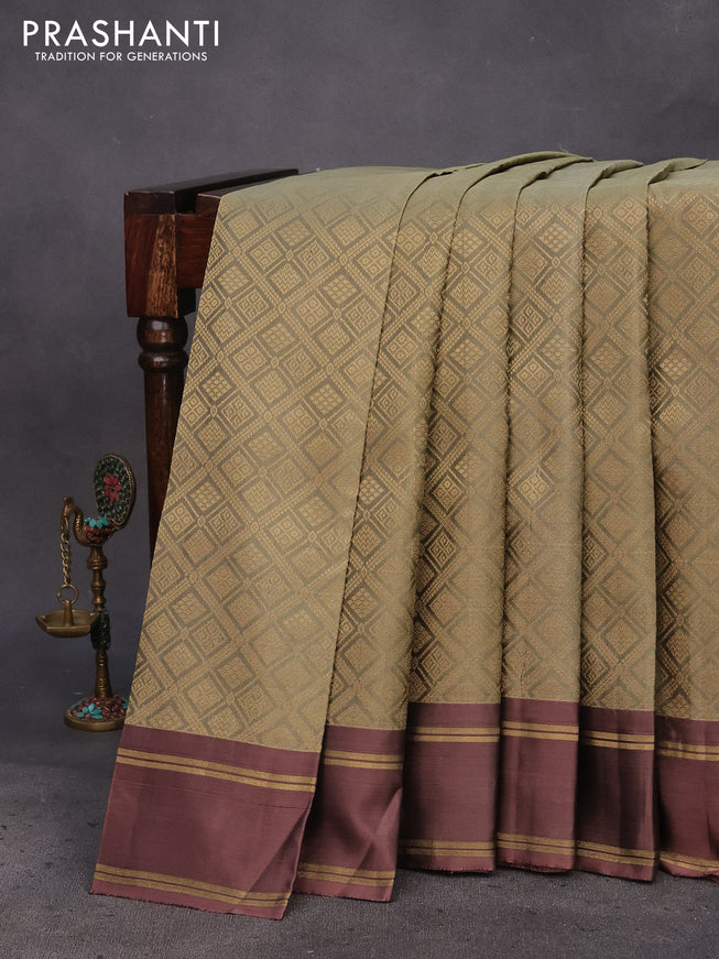 Kanchipuram silk saree elaichi green shade and rosy brown with allover zari woven brocade weaves and rettapet zari woven border