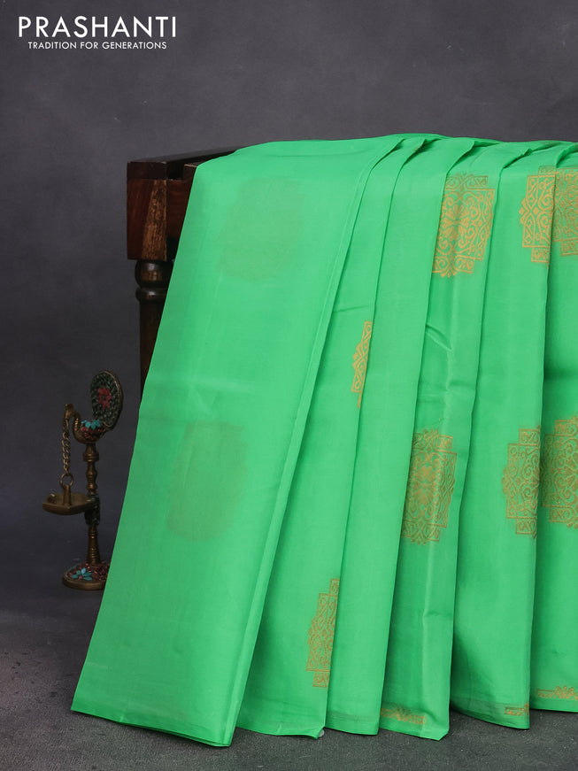 Kanchipuram silk saree green and navy blue with copper zari woven buttas in borderless style