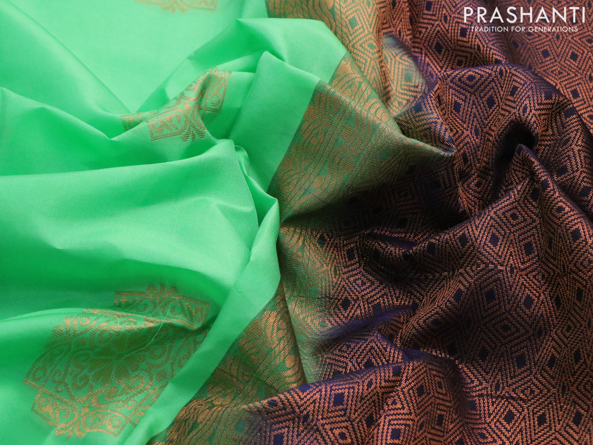 Kanchipuram silk saree green and navy blue with copper zari woven buttas in borderless style