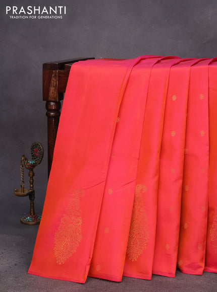 Kanchipuram silk saree dual shade of pinkish orange and elaichi green with zari woven buttas in borderless style