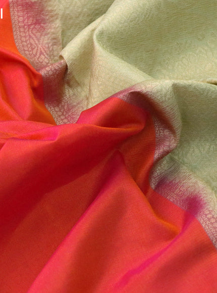 Kanchipuram silk saree dual shade of pinkish orange and elaichi green with zari woven buttas in borderless style