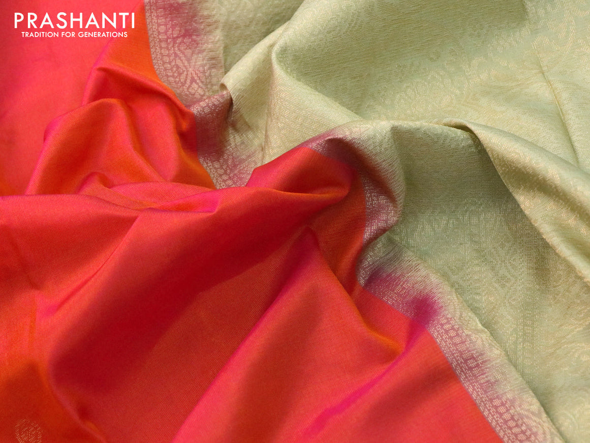 Kanchipuram silk saree dual shade of pinkish orange and elaichi green with zari woven buttas in borderless style