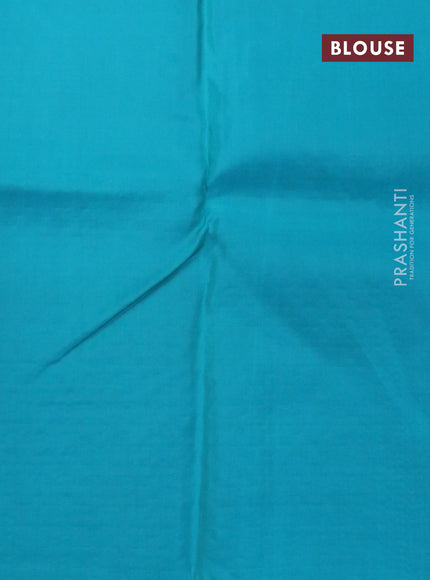 Kanchipuram silk saree light pink and teal blue with allover zari weaves in borderless style