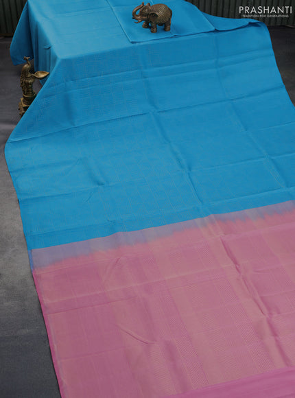 Kanchipuram silk saree blue and light pink with allover zari woven brocade weaves in borderless style