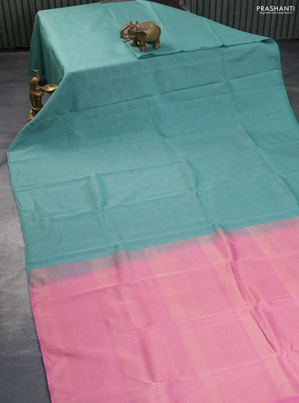 Kanchipuram silk saree pastel green shade and light pink with allover zari woven brocade weaves in borderless style