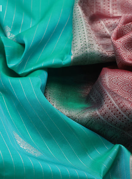 Kanchipuram silk saree teal green shade and maroon with allover silver zari strip weaves & buttas and long silver zari woven border