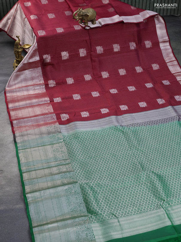 Kanchipuram silk saree maroon and green with allover silver zari strip weaves & buttas and long silver zari woven border