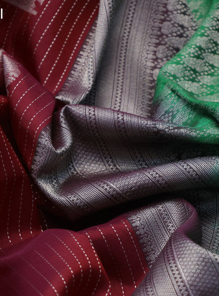 Kanchipuram silk saree maroon and green with allover silver zari strip weaves & buttas and long silver zari woven border