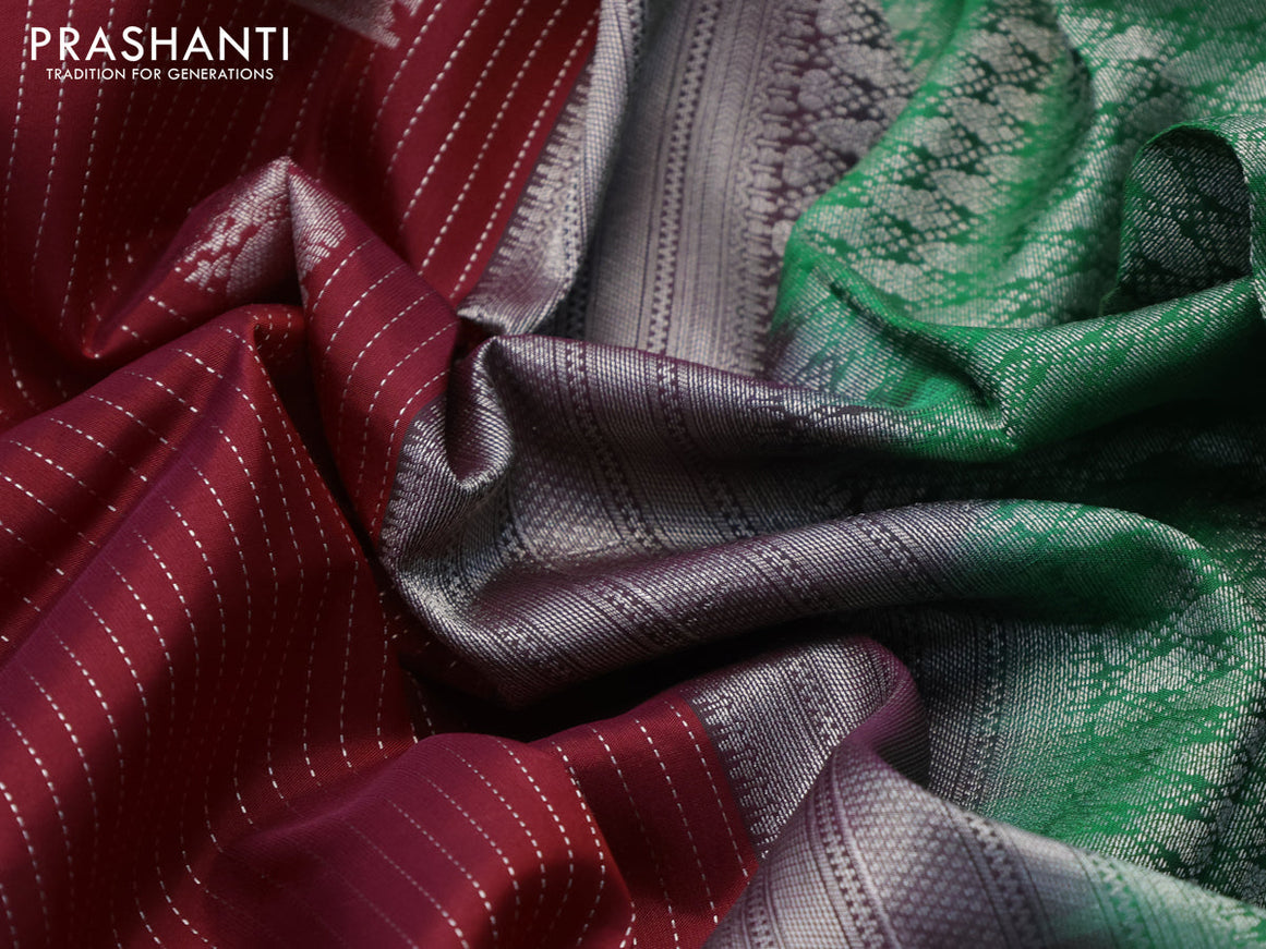 Kanchipuram silk saree maroon and green with allover silver zari strip weaves & buttas and long silver zari woven border