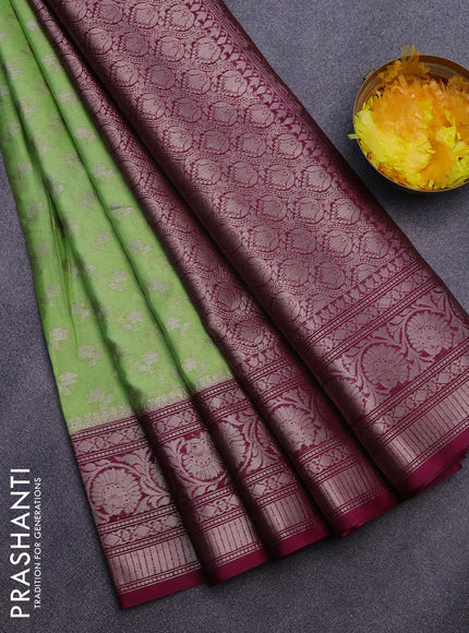 Banarasi semi silk saree pista green and wine shade with allover silver zari woven floral buttas and zari woven border