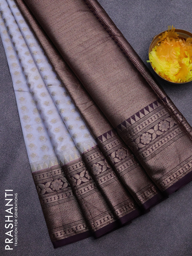 Banarasi semi silk saree pastel grey and deep violet with allover zari woven butta weaves and woven border