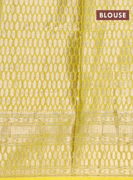 Banarasi semi silk saree bottle green and lime yellow with thread & zari woven buttas and woven border