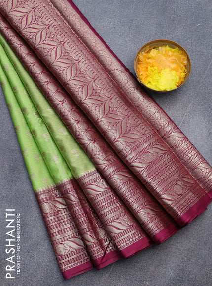 Banarasi semi silk saree pista green and wine shade with allover floral zari woven buttas and long woven border