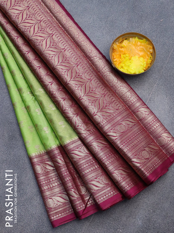 Banarasi semi silk saree pista green and wine shade with allover floral zari woven buttas and long woven border