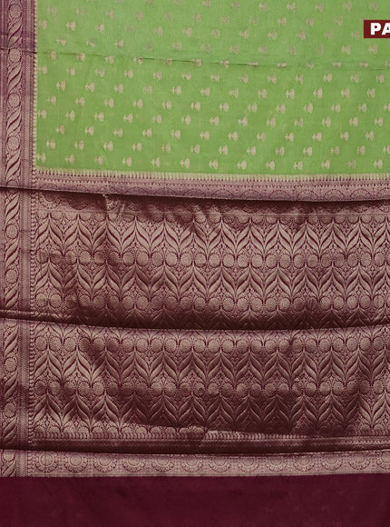 Banarasi semi silk saree pista green and wine shade with allover floral zari woven buttas and long woven border