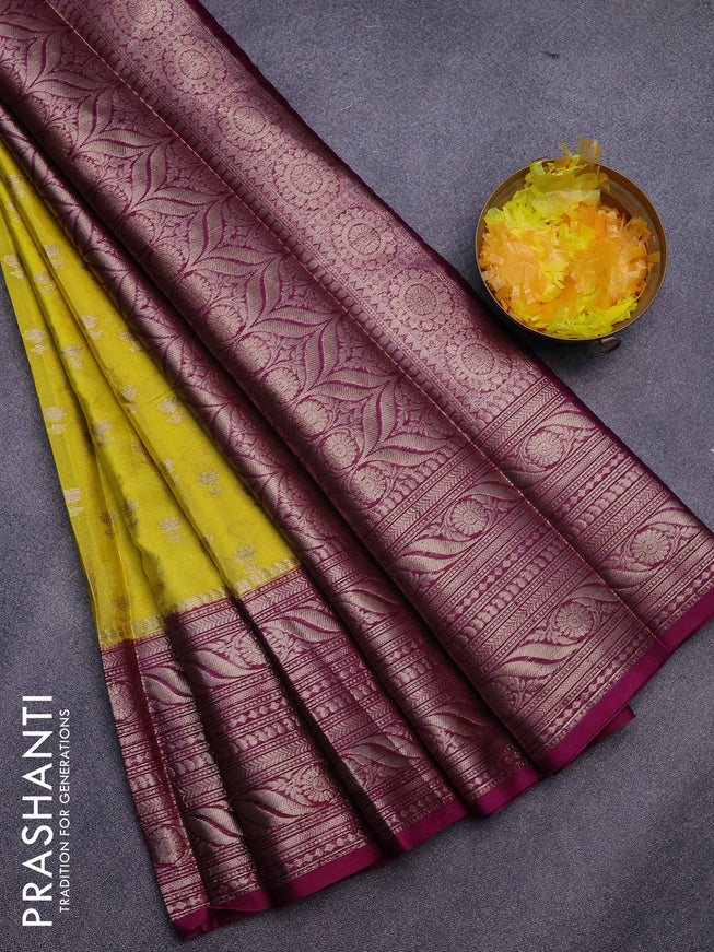 Banarasi semi silk saree yellow and purple with allover floral zari woven buttas and long woven border