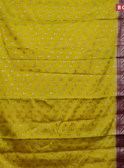 Banarasi semi silk saree yellow and purple with allover floral zari woven buttas and long woven border