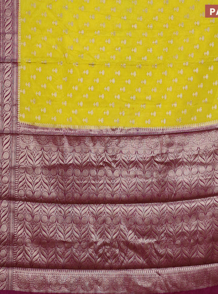 Banarasi semi silk saree yellow and purple with allover floral zari woven buttas and long woven border