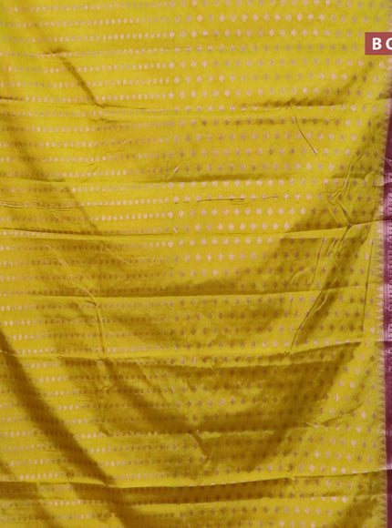 Banarasi semi silk saree lime yellow and purple with allover zari woven buttas and zari woven border